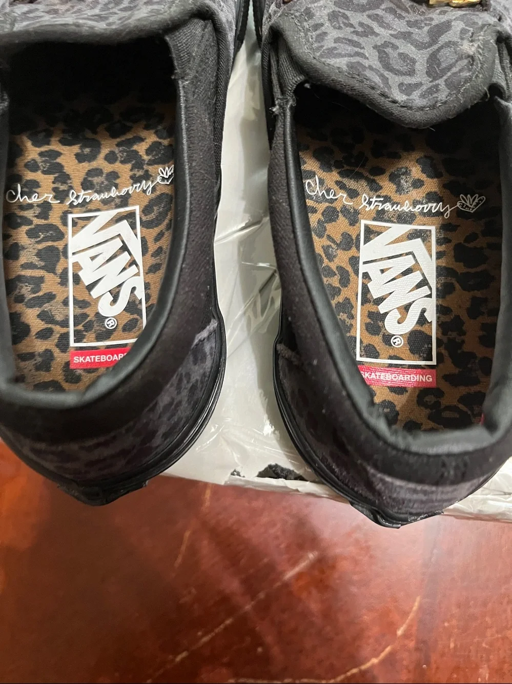 Vans Men’s Black Leopard-Print Slip-On with Gold Chain Accent